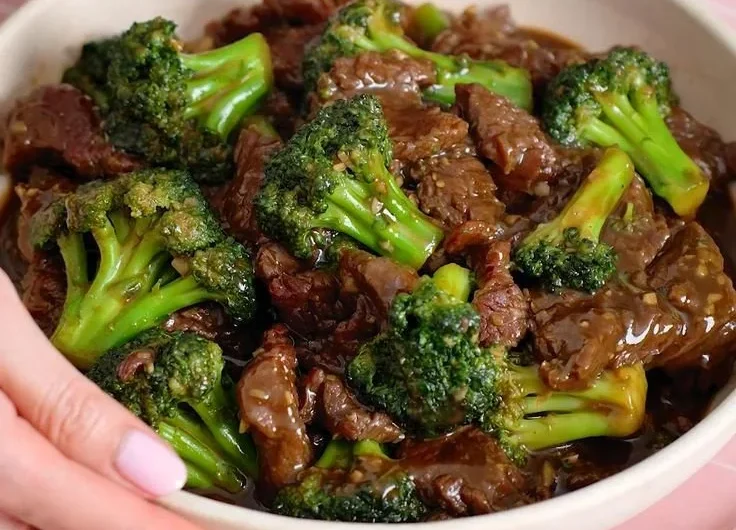 Plate of Beef and Broccoli Stir-Fry garnished with sesame seeds