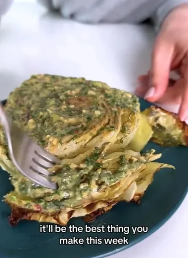 Delicious roasted cabbage steaks topped with flavorful herb butter