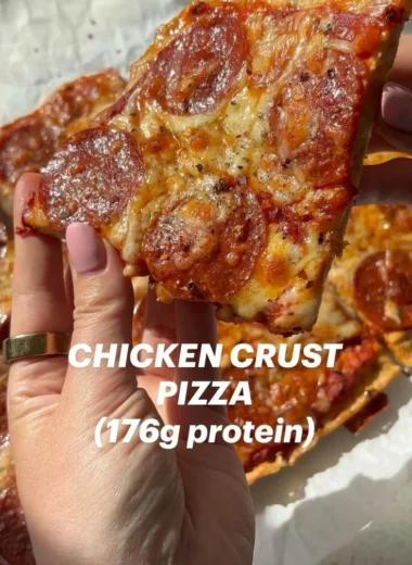 Homemade Chicken Crust Pizza topped with fresh ingredients and cheese