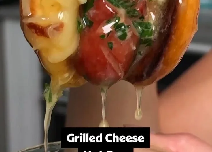 Garlic butter grilled cheese hot dogs with melted cheese and crispy bread