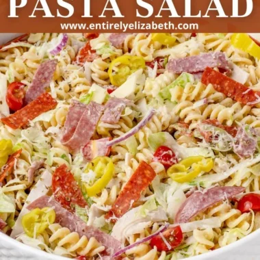 Colorful Grinder Pasta Salad with vegetables and dressing in a bowl