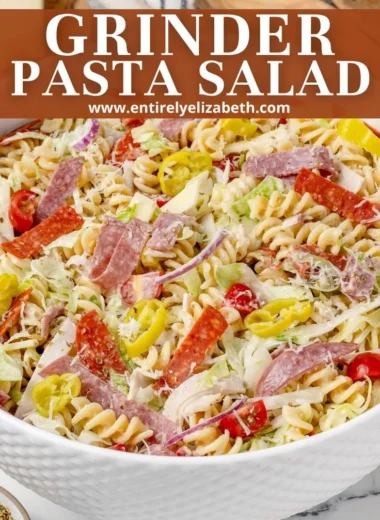 Colorful Grinder Pasta Salad with vegetables and dressing in a bowl