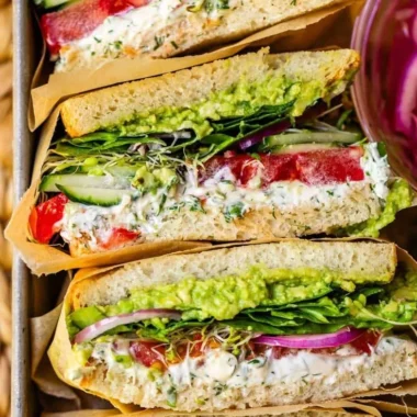 Laura's Amazing Fresh Veggie Sandwich with colorful vegetables and healthy ingredients