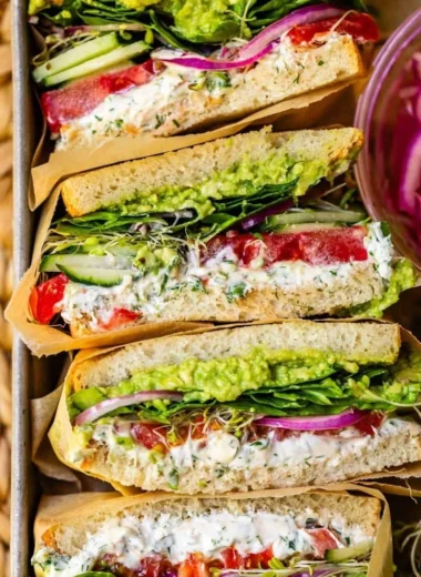 Laura's Amazing Fresh Veggie Sandwich with colorful vegetables and healthy ingredients