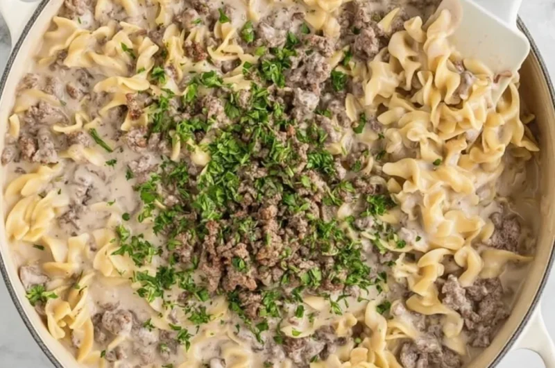 Delicious 30-Minute Ground Beef Stroganoff served with pasta and garnished with parsley