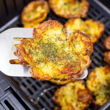 Crispy air fryer smashed potatoes cooked to perfection.