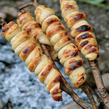 Deliciously baked Campfire Bread over an open flame