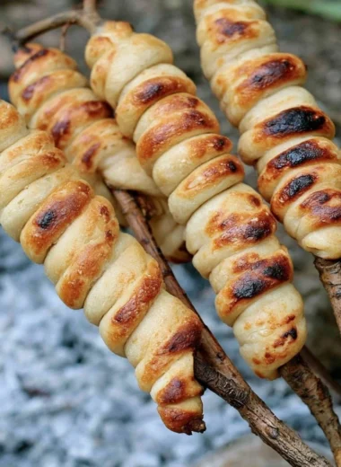 Deliciously baked Campfire Bread over an open flame