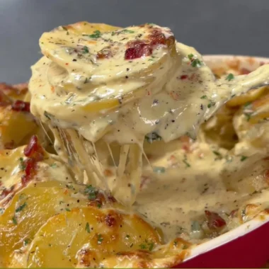 Creamy and cheesy au gratin potatoes baked to perfection.
