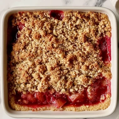 Classic rhubarb crumble bars topped with a golden crumble topping