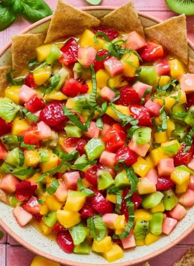 Bowl of fresh fruit salsa served with cinnamon sugar tortilla chips