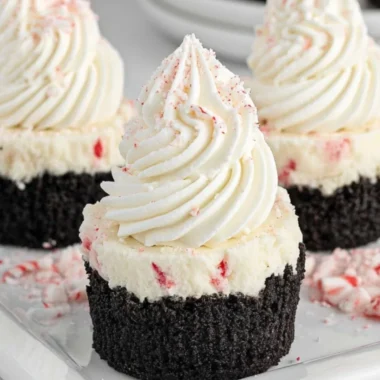 Mini no-bake peppermint cheesecakes topped with festive decorations