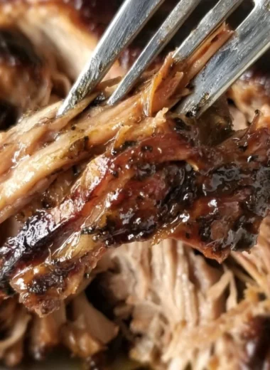 Slow cooker balsamic brown sugar pork roast served with vegetables