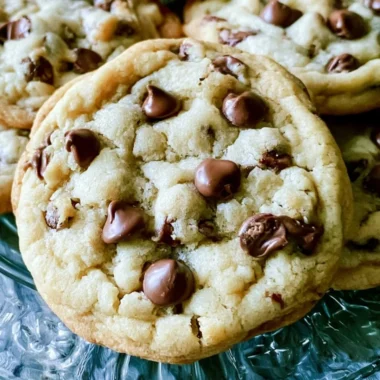 Freshly baked soft batch chocolate chip cookies with melted chocolate chips