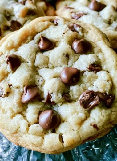 Freshly baked soft batch chocolate chip cookies with melted chocolate chips