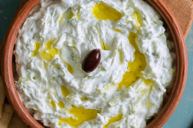Delicious Greek tzatziki sauce with cucumber and yogurt served in a bowl