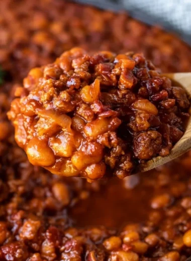 Delicious cozy cowboy baked beans in a rustic bowl