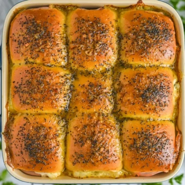Cozy ham and cheese sliders served on a platter for a delicious snack