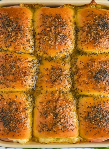 Cozy ham and cheese sliders served on a platter for a delicious snack