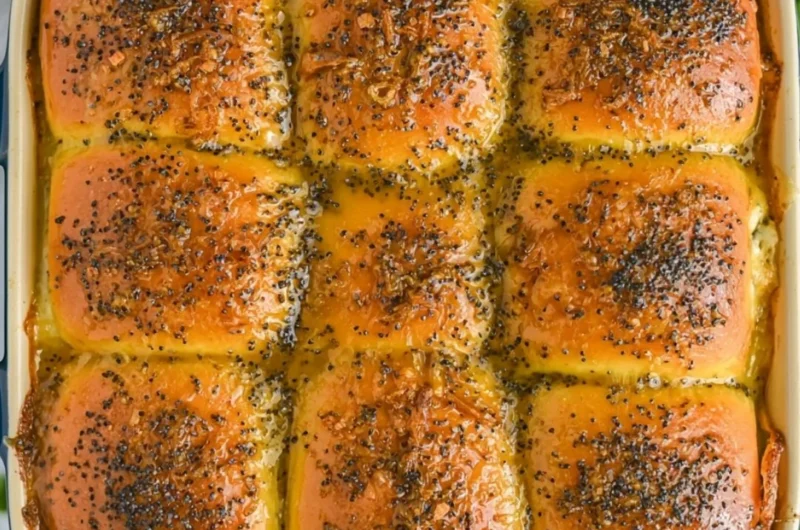 Cozy ham and cheese sliders served on a platter for a delicious snack