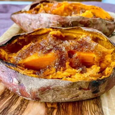Delicious smoked sweet potatoes on a grill ready to serve.