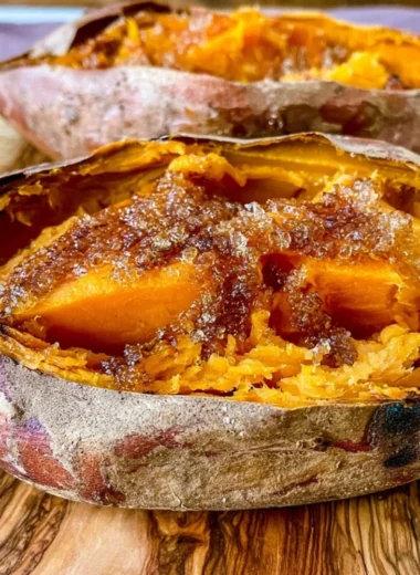 Delicious smoked sweet potatoes on a grill ready to serve.