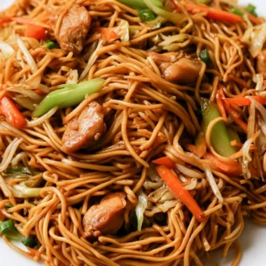 30-Minute Chicken Chow Mein served with colorful vegetables and noodles.