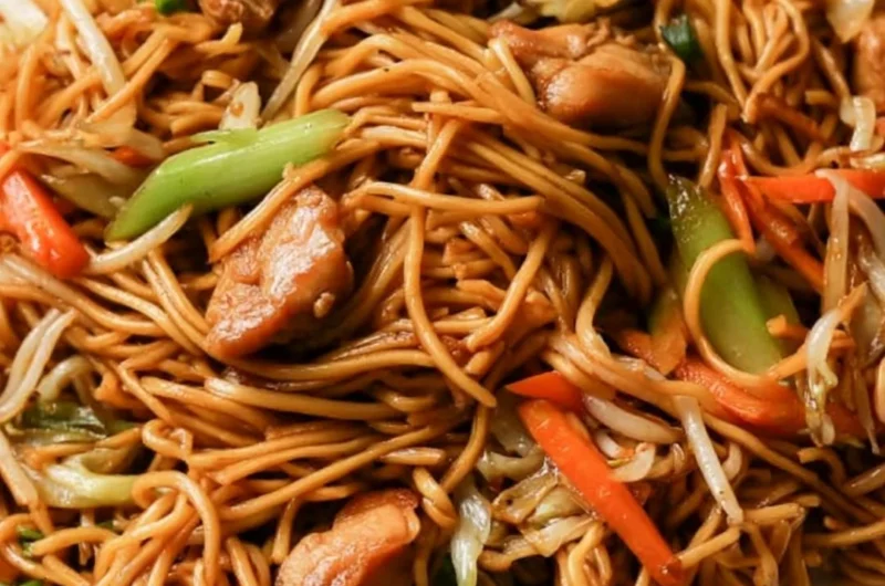 30-Minute Chicken Chow Mein served with colorful vegetables and noodles.