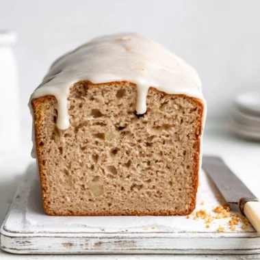 Cozy apple spice cake with warm spices and fresh apples, perfect for fall.